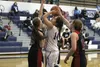 Palmer's Desi Molina splits a pair of defenders and goes toward the basket during a win over Juneau-Douglas Jan. 9 at Palmer High School. JEREMIAH BARTZ/Frontiersman