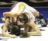 Colony's Robert Zimmerman wrestles Lathrop's Micah Ee during the 98-pound final of the Lancer Smith Memorial Nov. 22 at Palmer High School. Jeremiah Bartz/Frontiersman