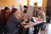Participants paint and socialize at The Headless Horseman restaurant. Jacob Mann/Frontiersman