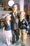 On Easter Sunday in 1995, Logan Marre, 8, center, who died from
Lymphocytic Leukemia in 1998, stands with his brother Casey, 5,
right. and sister Meghan, 4. Now 16, Casey is running in the
26