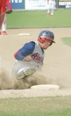 ROBERT DeBERRY/Frontiersman Alaska Road Warrior JD Mayo slides
into third base durng the Warriors’ 9-3 win over Post 34 East
Sunday at Hermon Brothers Field in Palmer.