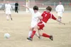 Wasilla midfielder Jimmy Sliwa, right, challenges Colony's
Bridger Van Ness during a game last spring. As a junior, Sliwa
scored 10 goals for the Warriors and recently signed to play
college 