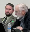 MSBSD school board member Jacob Butcher, seen here with fellow school board member Ole Larson, resigned effective immediately following an out-of-state move. The district said it will have de