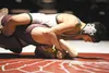 Colony's Bryce Adams grapples with Dimonds Scott Harris in the 98-pound final of the North/South Invitational at Wasilla High earlier this year. Adams, 31-3 this season, is among a number of 