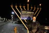 Rabbi Mendy Greenberg stands in front of the Mat-Su Jewish Center's public menorah in downtown Palmer. Frontiersman file photo