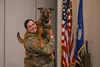 U.S. Air Force Senior Airman Kaitlynd Newland, a military working dog handler with the 673d Security Forces Squadron, introduces MWD Zzakira to medical responders at the medical training faci