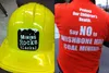 (ANDREW WELLNER/Frontiersman) At Tuesday's Mat-Su Borough
Assembly meeting, residents on both sides of the issued showed up
wearing clothing showing their feelings about a proposed coal mine
