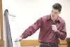 ROBERT DeBERRY/Frontiersman Clay Hein, 20, of Wasilla, testifies
in a Palmer courtroom. as to his position when he fired his gun at
a car in April 2007. Hein was acquited on all charges.