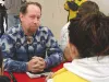 Sen. Scott Ogan talks to a student at Wasilla High School
student during lunch Monday afternoon while visiting the school.
Photo courtesy of WHS.