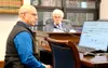 Alaska Department of Public Safety Deputy Commissioner Bryan Barlow testifies before the House Judiciary Committee on January 24, 2024. Rep. Cliff Groh, D-Anchorage looks on in the background
