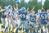 ROBERT DeBERRY/Frontiersman Palmer senior J.D. Mitchell (49) and
junior Brennan Bohman celebrate with teammates following Palmer’s
thrilling 13-7 double-overtime win over the West Valley Wolf