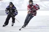 Noah Gillespie, skating on a team sponsored by Rep. Mark Neuman in the U18 division, moves the puck forward during a game of 4-on-4 pond hockey on the first day of the 2017 Last Frontier Pond