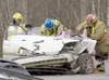 ROBERT DeBERRY/Frontiersman Central Mat-Su Fire Department
rescue personnel tend to two people involved in a three-car
accident at the corner of Bogard and Engstrom roads Friday
afternoon. Th
