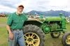 Rich Greeno stands in front of his 1935 John Deer tractor. Jacob Mann/Frontiersman