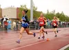 Palmer Senior Sophie Wright competes in the 1,600 meters at the ASAA/First National Bank State Track and Field championships at Dimond High School on Saturday. Wright finished fifth in the ev