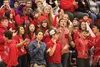 Wasilla Warriors fans cheer on the Wasilla volleyball squad during a 3-2 win over Palmer Oct. 27 at Wasilla High School. On Saturday, the Warriors battled back to reach the final of the North