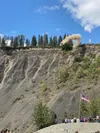 A Volkswagen Passat flies off a bluff above the Matanuska River Saturday during this year’s Arnie’s 4th of July in Glacier View. All-told 11 cars flew from the bluff this year, and organizers
