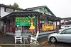 Mocha Moose manager Karena Forster, stands outside the cafe side of the business, started by her parents, Ben and Rena Harrell, as a drive-thru coffee stand in 1994. CAITLIN SKVORC/Frontiersm