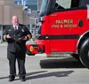 Palmer Fire and Rescue Chief Chad Cameron talks about their new fire engine during an Engine Push In ceremony. Jacob Mann/Frontiersman