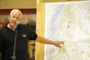 Division of Forestry Incident Commander Tom Kurth talks about the Sockeye fire response during a community meeting Wednesday evening at Houston Middle School.  Incident Command has issued a p