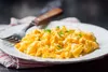 Don't bother adding milk or water to your scrambled eggs. Cook them slowly for a creamy result.
