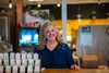 Tammy Shields behind the counter at her shop, Gladheart Acres, that she runs with her family.  KATIE STARK/Frontiersman