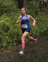 Palmer sophomore Katey Houser races around Wylie’s Corner. Tim Rockey/Frontiersman