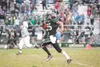 ROBERT DeBERRY/Frontiersman Colony junior flanker Del Ciucci
carries a Matt Jaronik pass 88 yards for a score in the third
quarter of Friday’s win over the Soldotna Stars at Colony High
Schoo