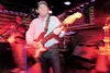 (ROBERT DeBERRY/Frontiersman) The Connection'€™s lead singer
Dave Stanberry entertains the crowd gathered at the Mug-Shot Saloon
on Friday night.