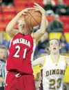 ROBERT DeBERRY/Frontiersman Wasilla Warrior Lesil Brown
intercepts a pass meant for Dimond's Lauren Hanley during the
Warriors Thursday at the Sullivan Arena in Anchorage.