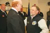 Mahlon Greene (left) receives his official promotion to chief of the Willow and Caswell fire departments from Vern Halter, who represents the area on the Mat-Su Borough Assembly. Photo courte