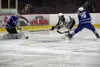Soldotna's Matthew Daugherty takes a shot on goal which Palmer goalie Cody Grogan stops with his pad. Easton Armstrong defends for Palmer on Friday at Soldotna Regional Sports Complex. Jeff H