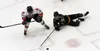 Colony's Foster Riekena tries to keep the puck away from a Juneau-Douglas defender during a state tournament win over the Bears Feb. 12, 2016, at the Menard Arena in Wasilla. Courtesy Bruce E
