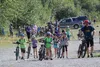 Matt Swalling, right, heads out of the Matanuska Lake parking lot on Wednesday, July 13 with a group of SprocKidz, so named for their enrollment in the Valley Mountain Bikers and Hikers summe