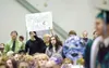 A proud parent holds a sign during Colony High School’s
graduation ceremony Tuesday. ROBERT DeBERRY/Frontiersman)