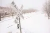 ROBERT DeBERRY/Frontiersman Snow covers the railroad tracks in
downtown Palmer Thursday afternoon. The Palmer City Council will
create an advisory committee of residents to help decide whethe