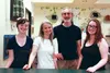 Kim and Greg Scully, center, own Magpie Clothing Exchange, where they employee their daughters, Julia, left, and, Madeline, a recent Palmer High School graduate. The business celebrated its f