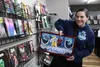Amie Jo Nieves holds an illustration gifted by Austin Ervin. Jacob Mann/Frontiersman.com