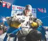 Jessie Holmes, arrives to the finish line under the burled arch in Nome to claim his second consecutive win at 9:32 p.m. March 17, 2026. Siri Raitto/Iditarod