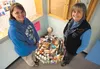 Sherrod Elementary School secretary Tracy Leigh and administrative secretary Linda Larson have challenged the students at Sherrod Elementary to make a birthday cake out of canned food for Lei