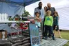 Rebels Haven Organics owner Joseph Mabry poses for a photo with his family. Jacob Mann/Frontiersman