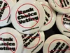 Pins supporting the repeal of ranked choice voting are seen on April 20, 2024, at the Republican state convention in Anchorage. James Brooks/Alaska Beacon