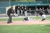 Mat-Su's Blake Avila works to avoid the tag at home plate during a 2-1 win over the Anchorage Bucs. Avila was called out on the play. Jeremiah Bartz/Frontiersman