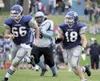 ROBERT DEBERRY/Frontiersman Collin Christiansen runs for a gain
after a catch during his senior season with the Palmer Moose.
Christiansen will play football at Concordia in Nebraska next
yea