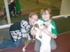 K.T. MCKEE/Frontiersman ABOVE: Jake Christensen, 12, and his
brother Chad, 11, goof around with their English bulldogs Princess
and Fuzzy. At age 9, Chad was the first child in the family to 