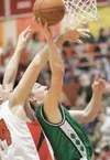 Colony senior Jaron Murphy reaches toward the basket during the
Knights' win over Wasilla on Saturday. ROBERT
DeBERRY/Frontiersman