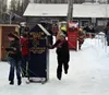 Willow Winter Carnival participants race their handmade outhouses. Frontiersman file photo