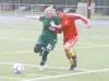 JEREMIAH BARTZ/Frontiersman Colony senior Bradi Day moves past
West Valley freshman Jill Phillips during the second half of a 3-0
loss to the Wolfpack on Saturday.
