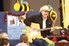 Alaska musician and Ultimate Survival Alaska Season 3 cast member Marty Raney sings one of his songs for students during an assembly at Palmer Junior Middle School Dec. 11. HEATHER A. RESZ/Fr