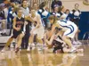 Palmer's Erin LaMere, left, and Kendall Venske scramble to get
the ball from kenai's Morgan Wensley during Friday's game at Palmer
High School. (ROBERT DeBERRY/Frontiersman)